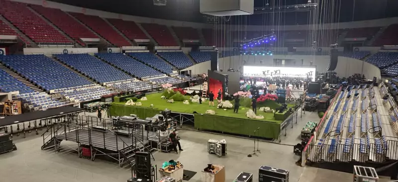 Production equipment and staging set up on an arena floor